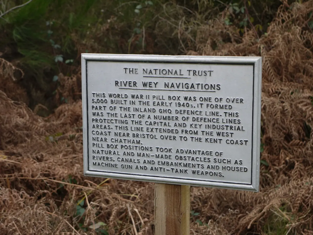 In the picture there is a board attached to a wooden pole, some information is mentioned on that...